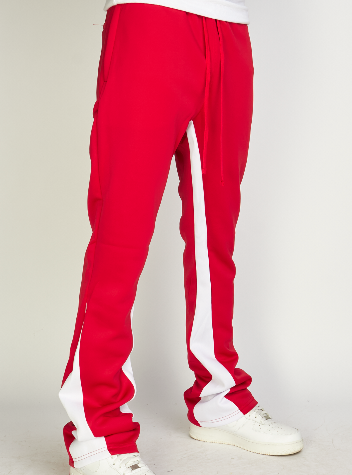 Red jogger pants with 2025 white stripe