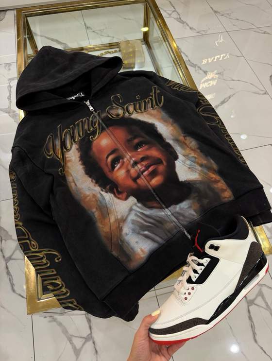 Instagram post: YOUNG SAINT FROM THE ORDINARY🔥 Loud graphics. Heavy hoodies. Made for those who never fit in.